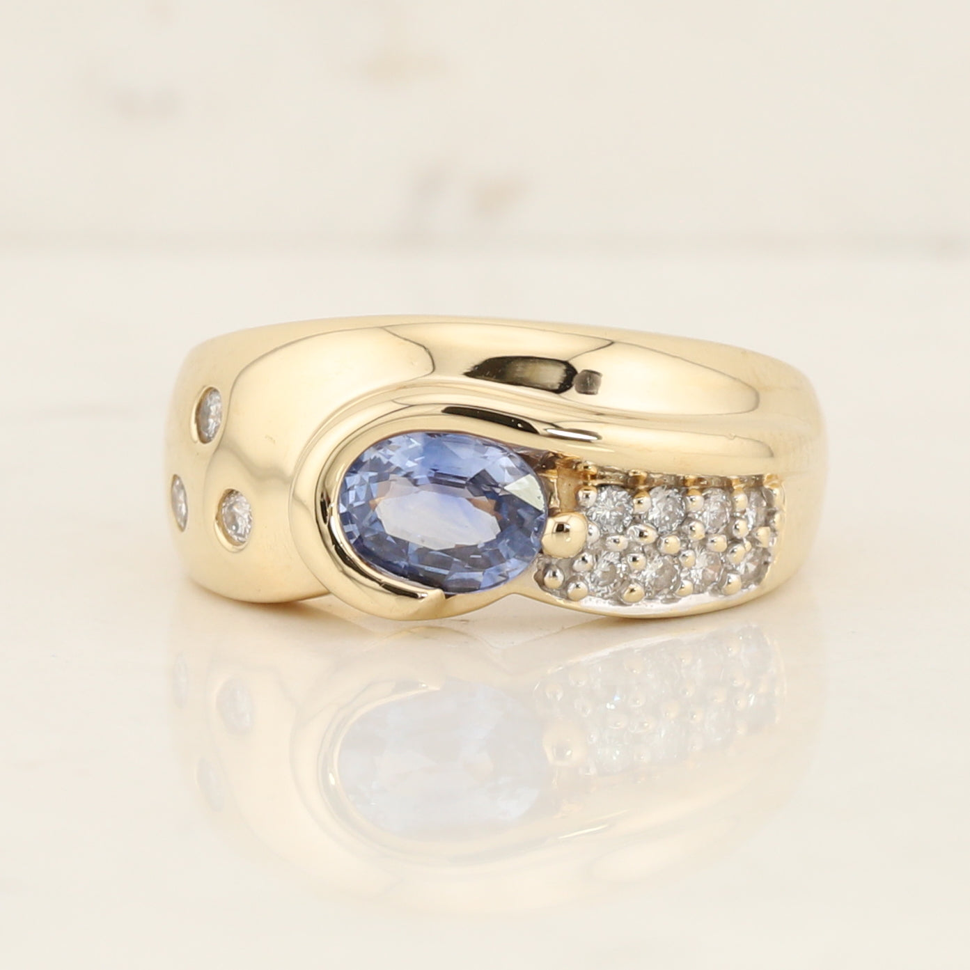 Modern Tanzanite & Diamond Ring