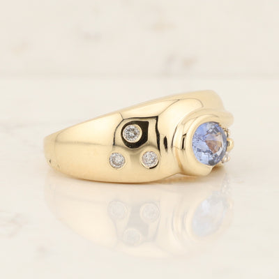 Modern Tanzanite & Diamond Ring