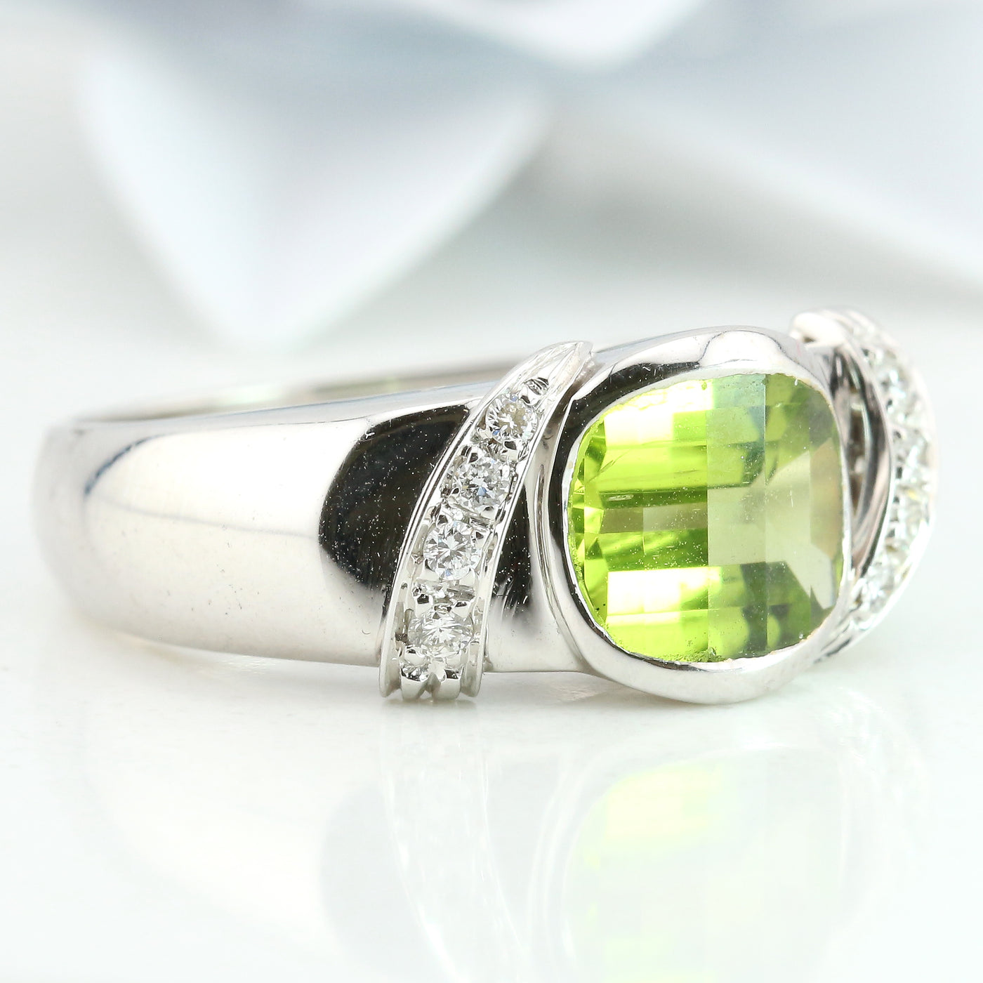 Peridot and diamond ring