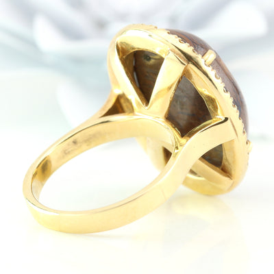 Boulder opal diamond halo ring
