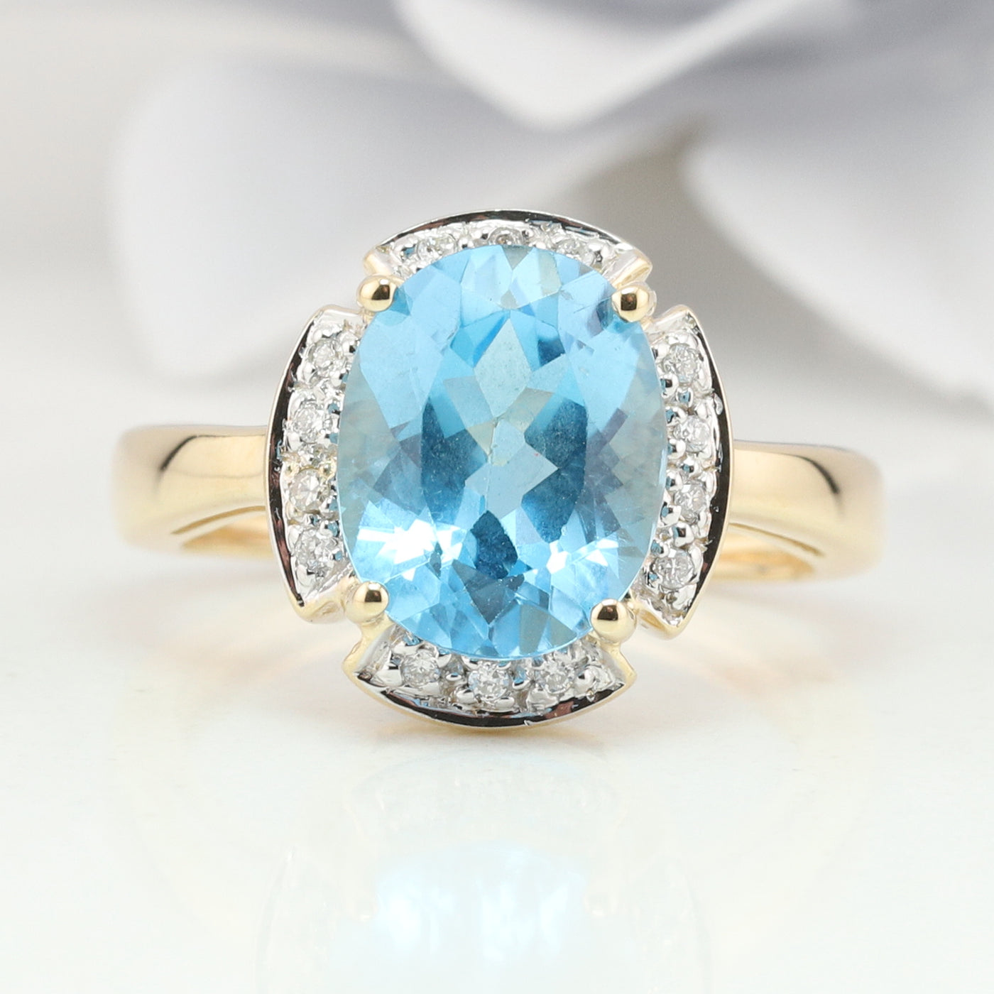 Blue Topaz and Diamond Ring