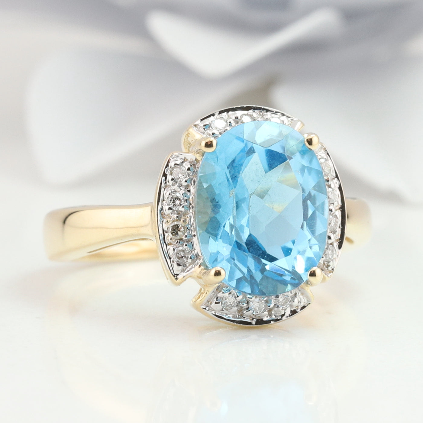 Blue Topaz and Diamond Ring